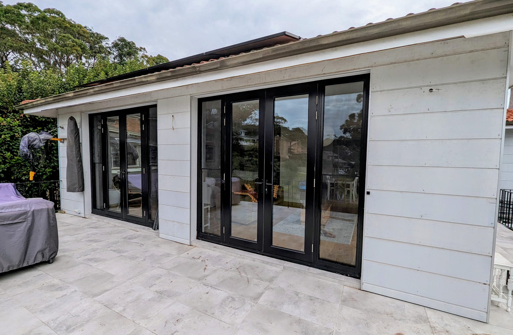 Cladding, door and window installation by HannaBuilt Construction